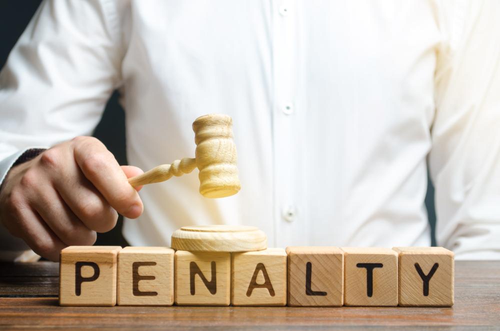 What are the penalties for non-compliance with the NYC benchmarking law?